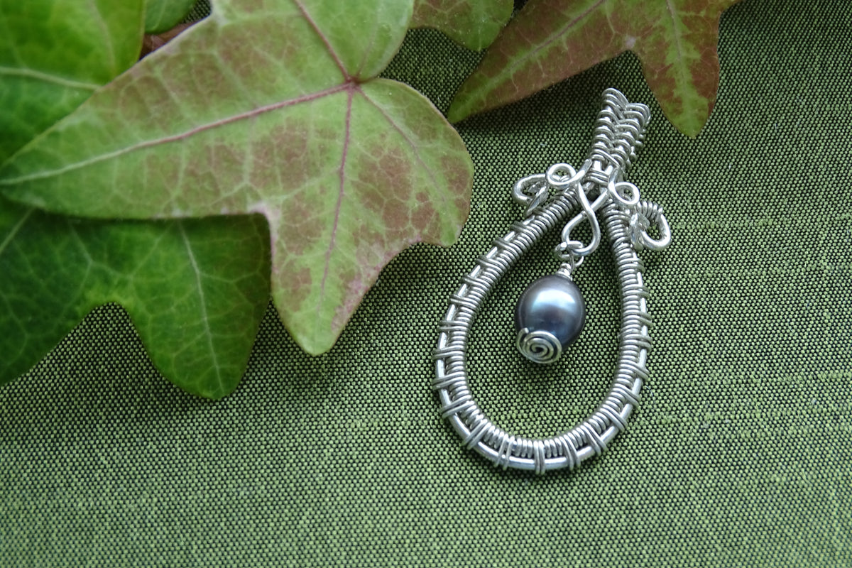Silver pendant with pearl